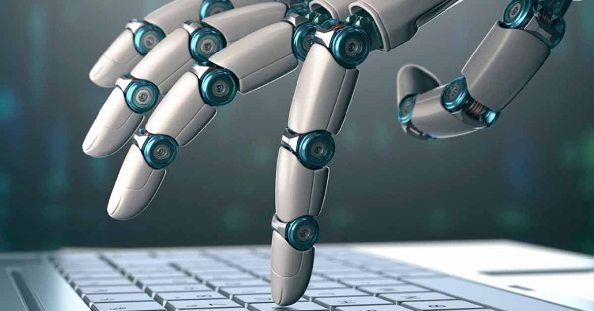 robot hand on laptop keyboard