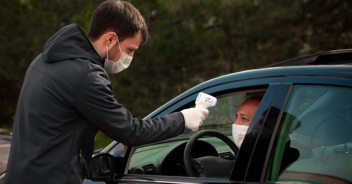 covid temperature check in a car