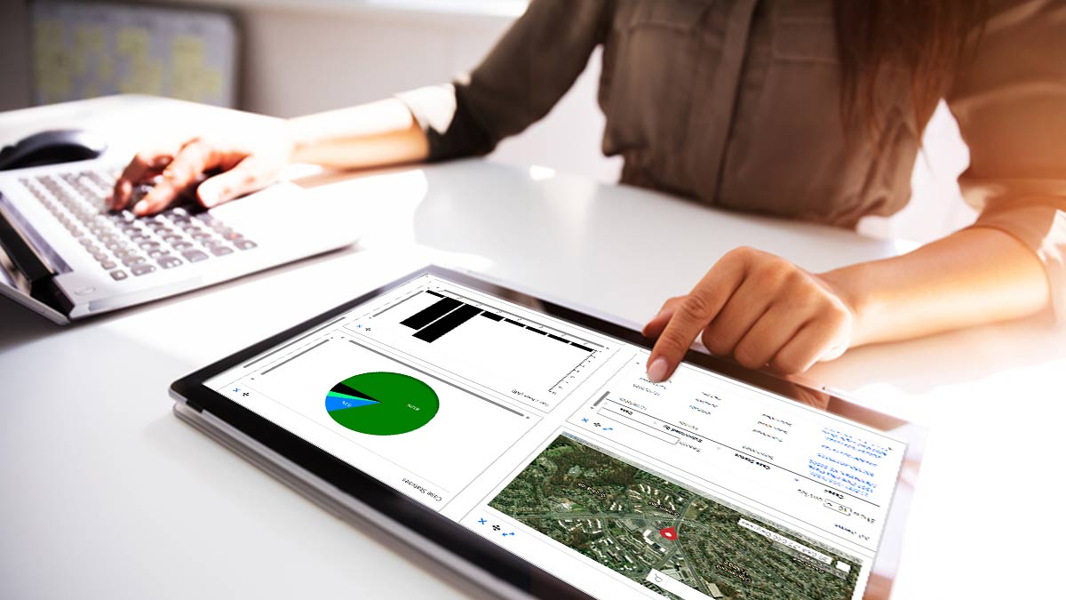Businesswoman Checking Permitting Report On Digital Tablet