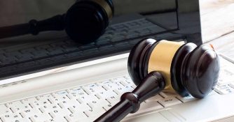 gavel laying on laptop