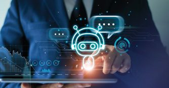 man holding a tablet with chatbot coming out of the screen