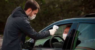 covid temperature check in a car