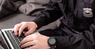 police officer on laptop