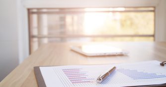 paper and pen on desk